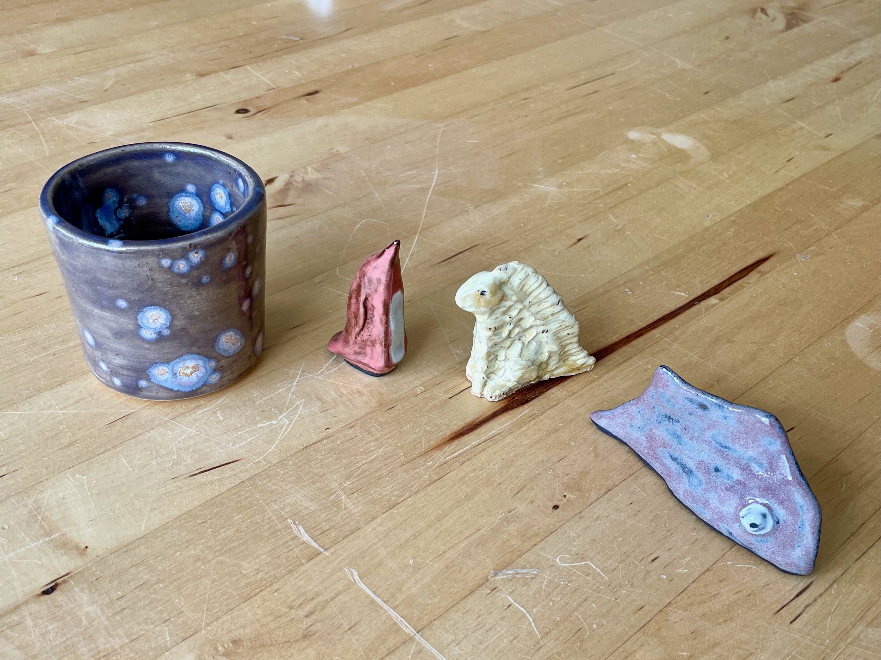 Ceramic cup and critters