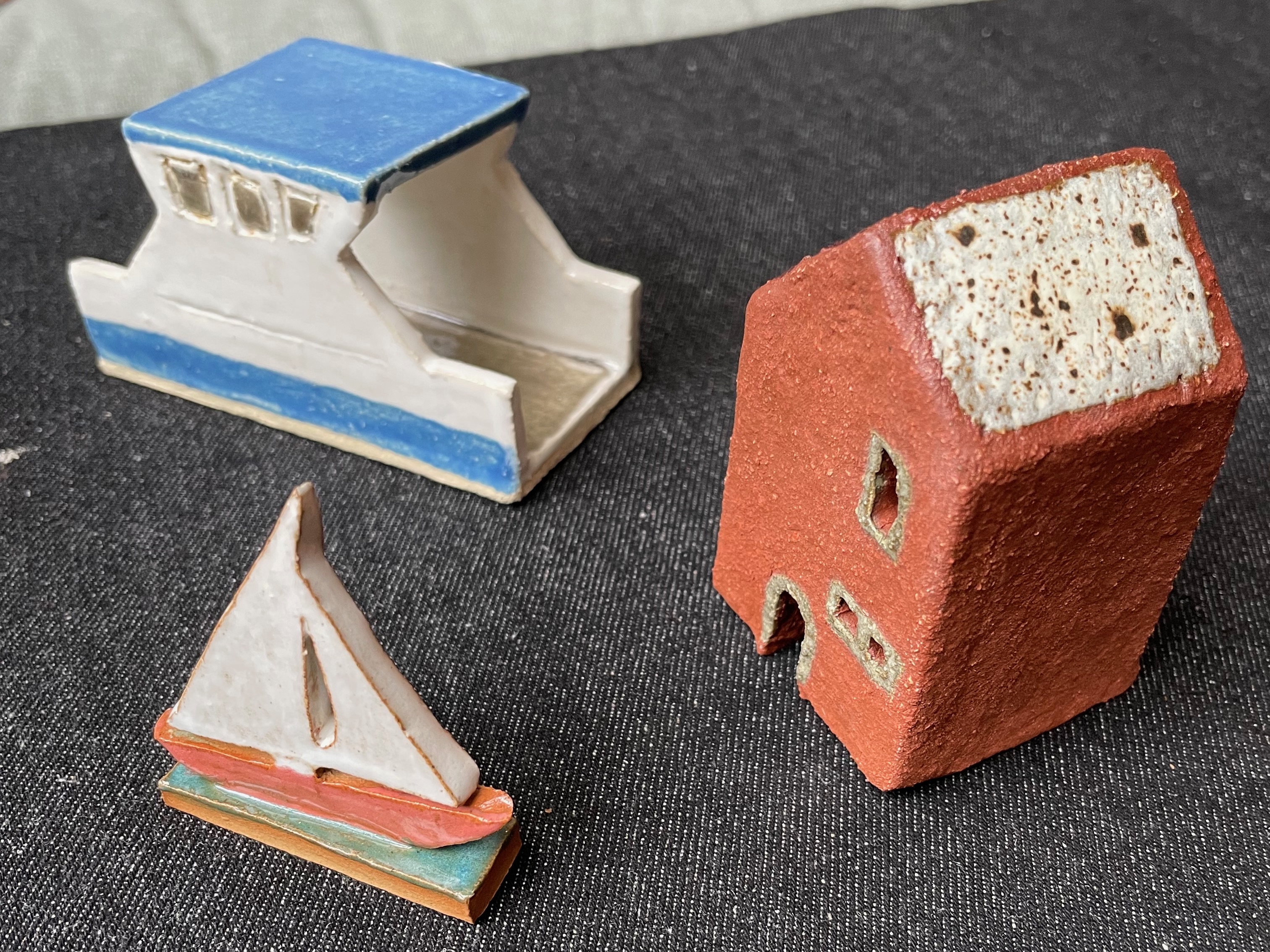 Ceramic boats and house